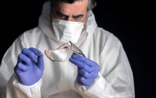 Pharmaceutical worker examining material